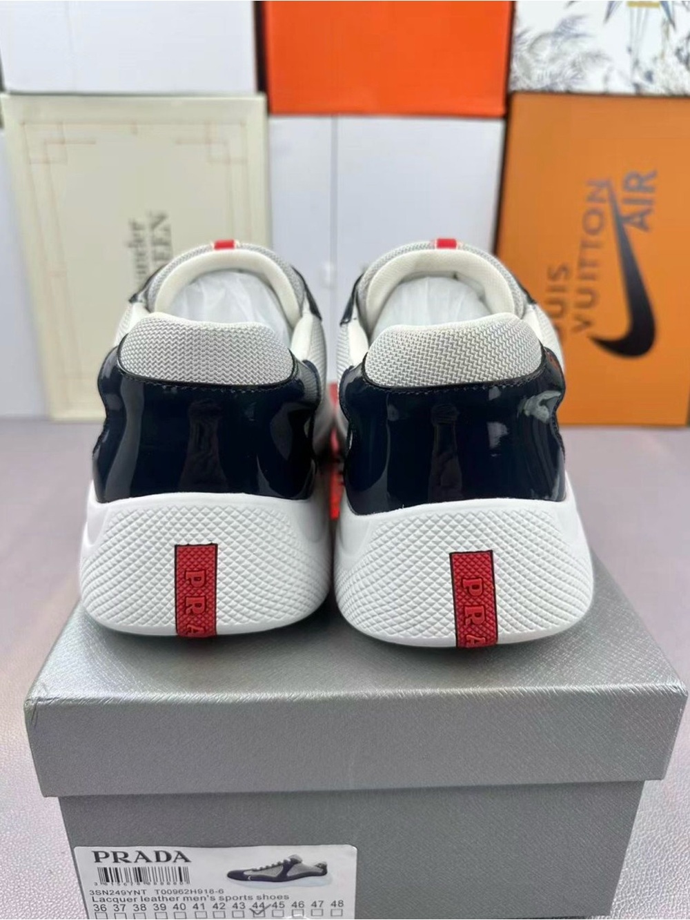 Prada men White, Navy and Red Low-Top Sneakers